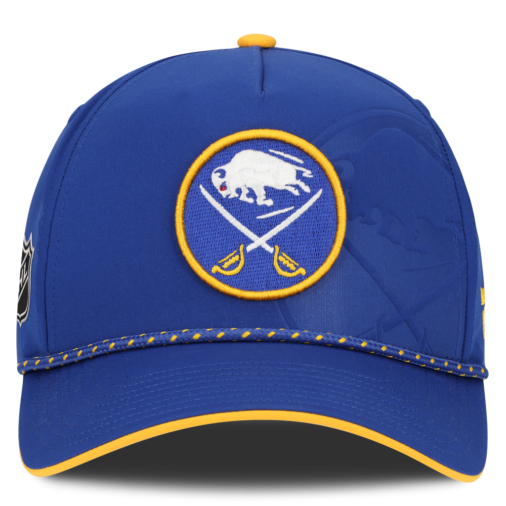 Blue cap with a logo featuring a buffalo and crossed swords on a white background