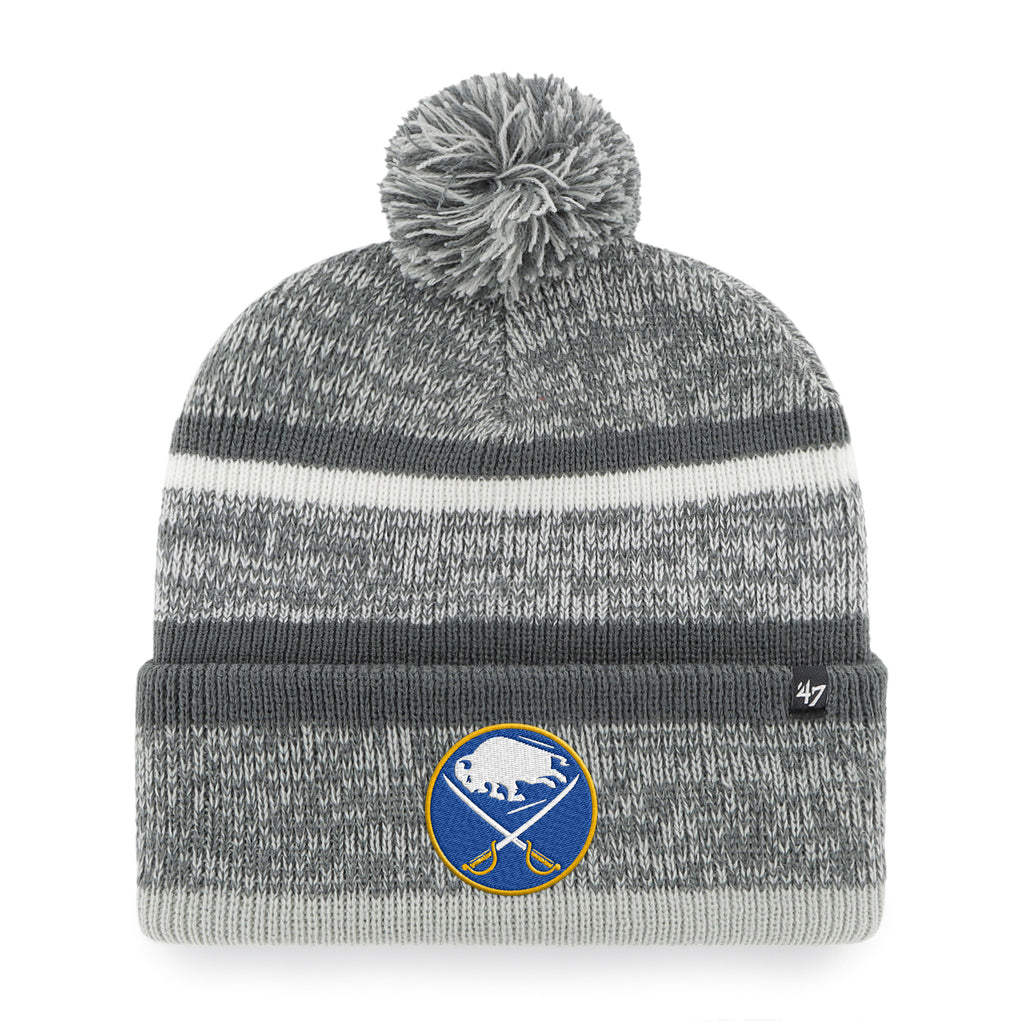 Gray and white striped beanie with pom-pom and sports team logo on a white background