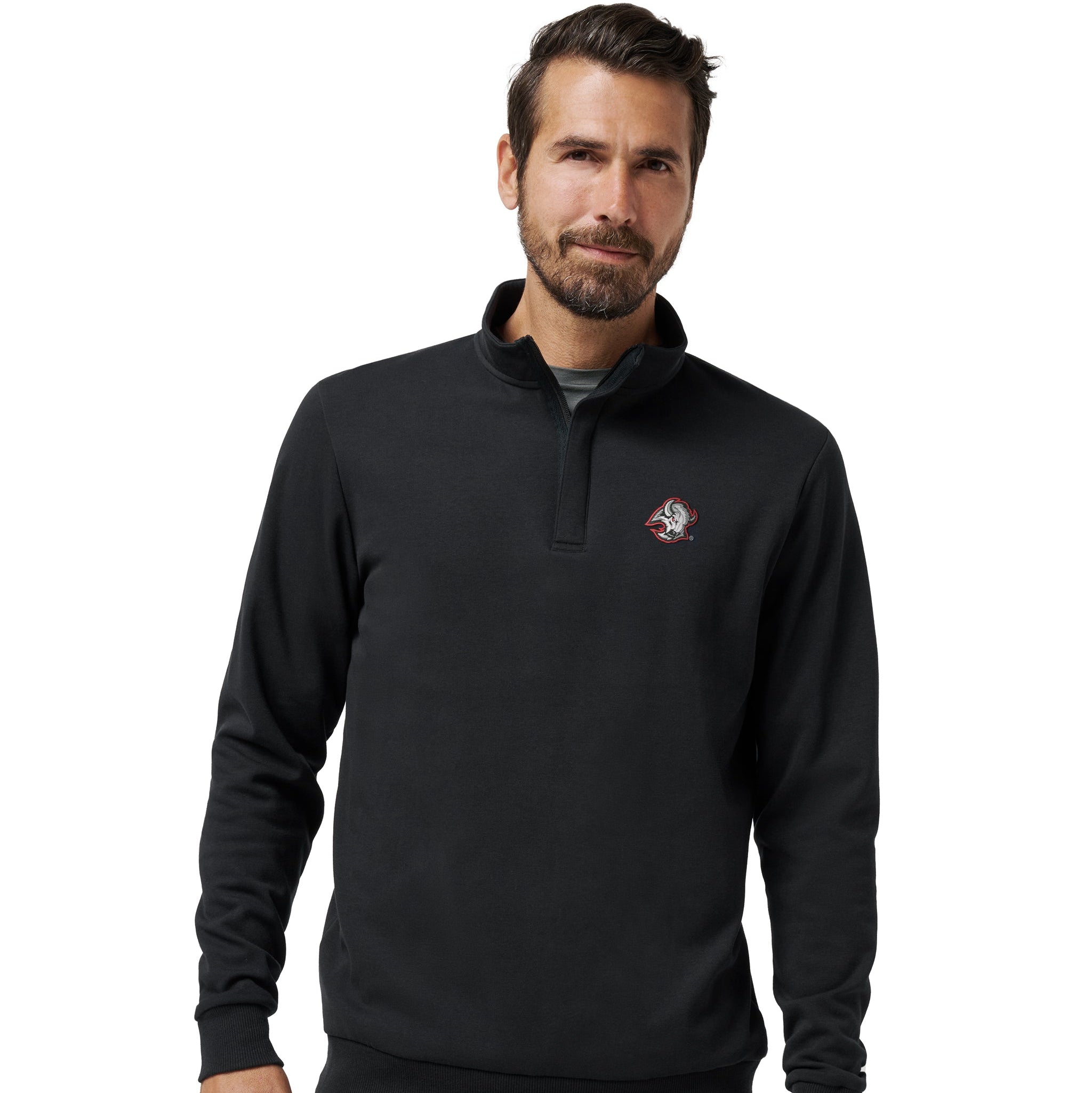 A man wearing a black long-sleeve quarter-zip pullover sweatshirt with a small embroidered logo on the left chest, paired with gray pants, against a plain white background.