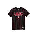 A black short-sleeve t-shirt with thin red vertical pinstripes, featuring 'SABRES BUFFALO' printed in red and white across the chest and a team logo below it, displayed on a solid white background.