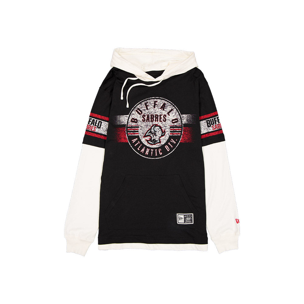 A black and white Buffalo Sabres athletic hoodie with a distressed circular logo on the chest, striped sleeves, and white drawstrings, shown against a plain white background.