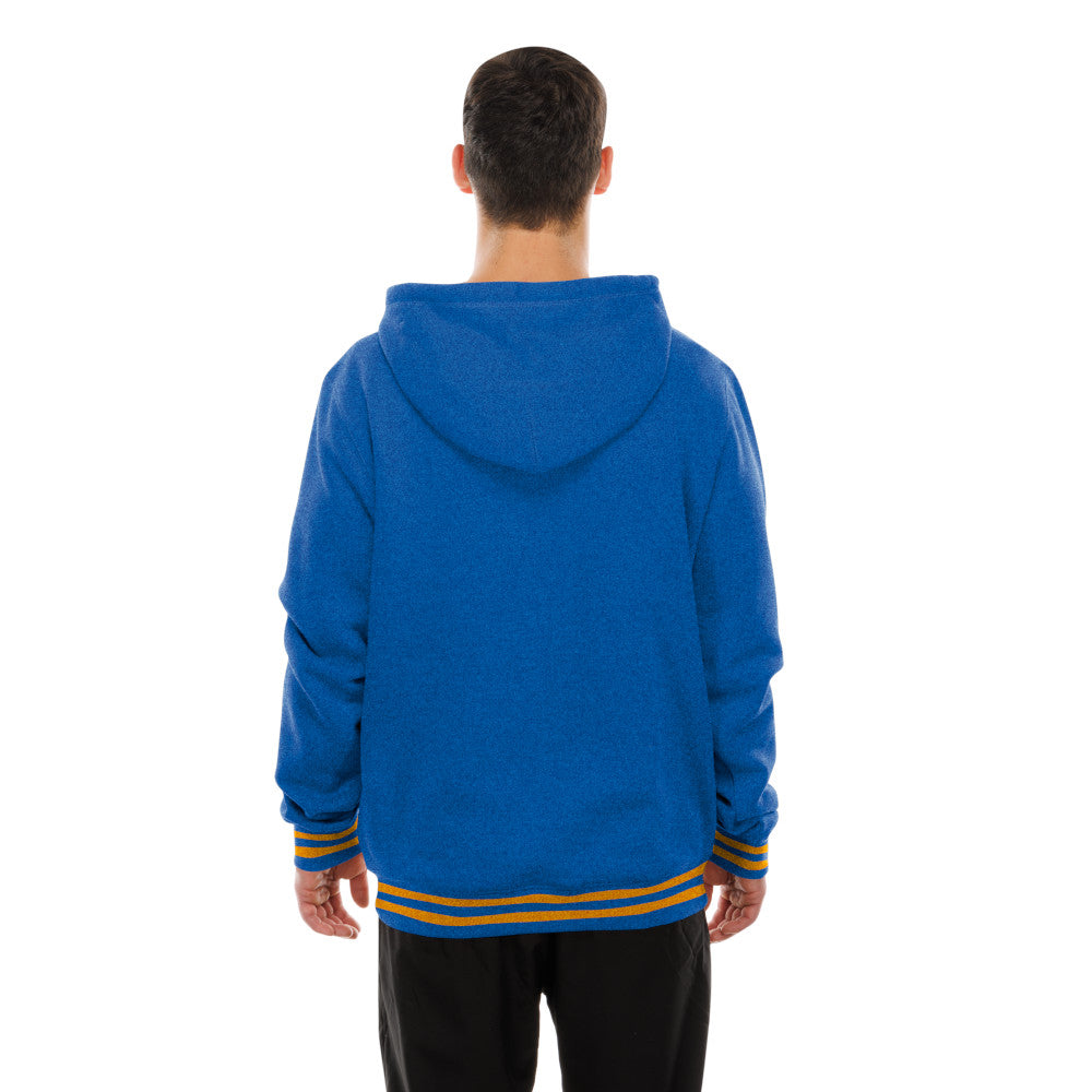 A man viewed from behind wearing a bright blue hooded sweatshirt with yellow and orange striped ribbed cuffs and hem, paired with black pants, against a plain white background.