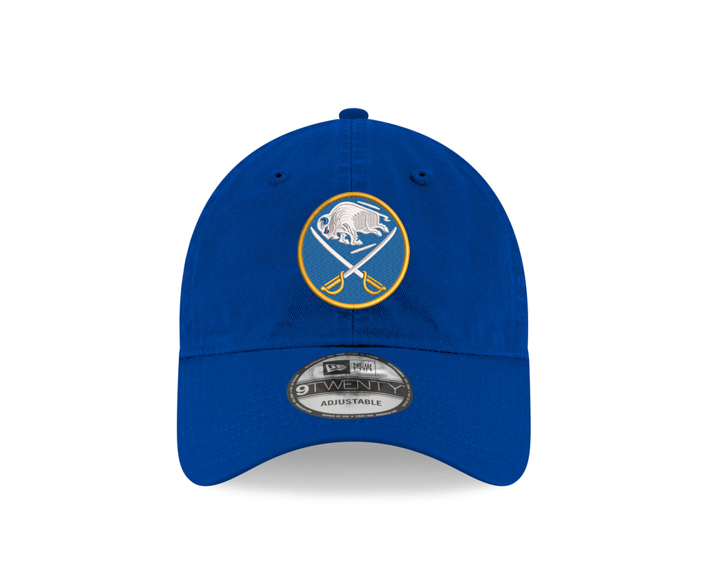 Blue baseball cap with a logo on a white background