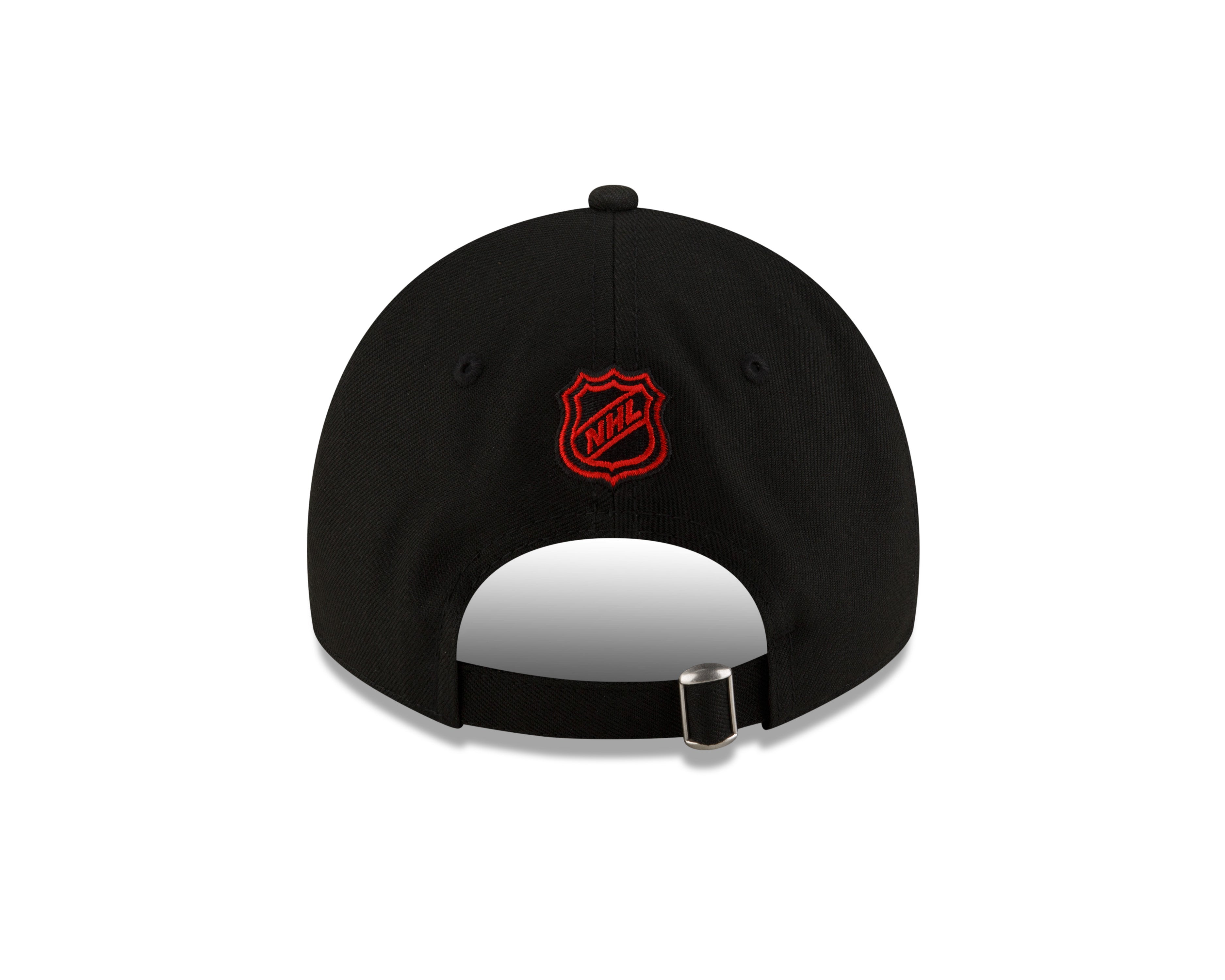 Black cap with a red logo on a white background