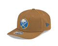 Brown baseball cap with a logo on a white background