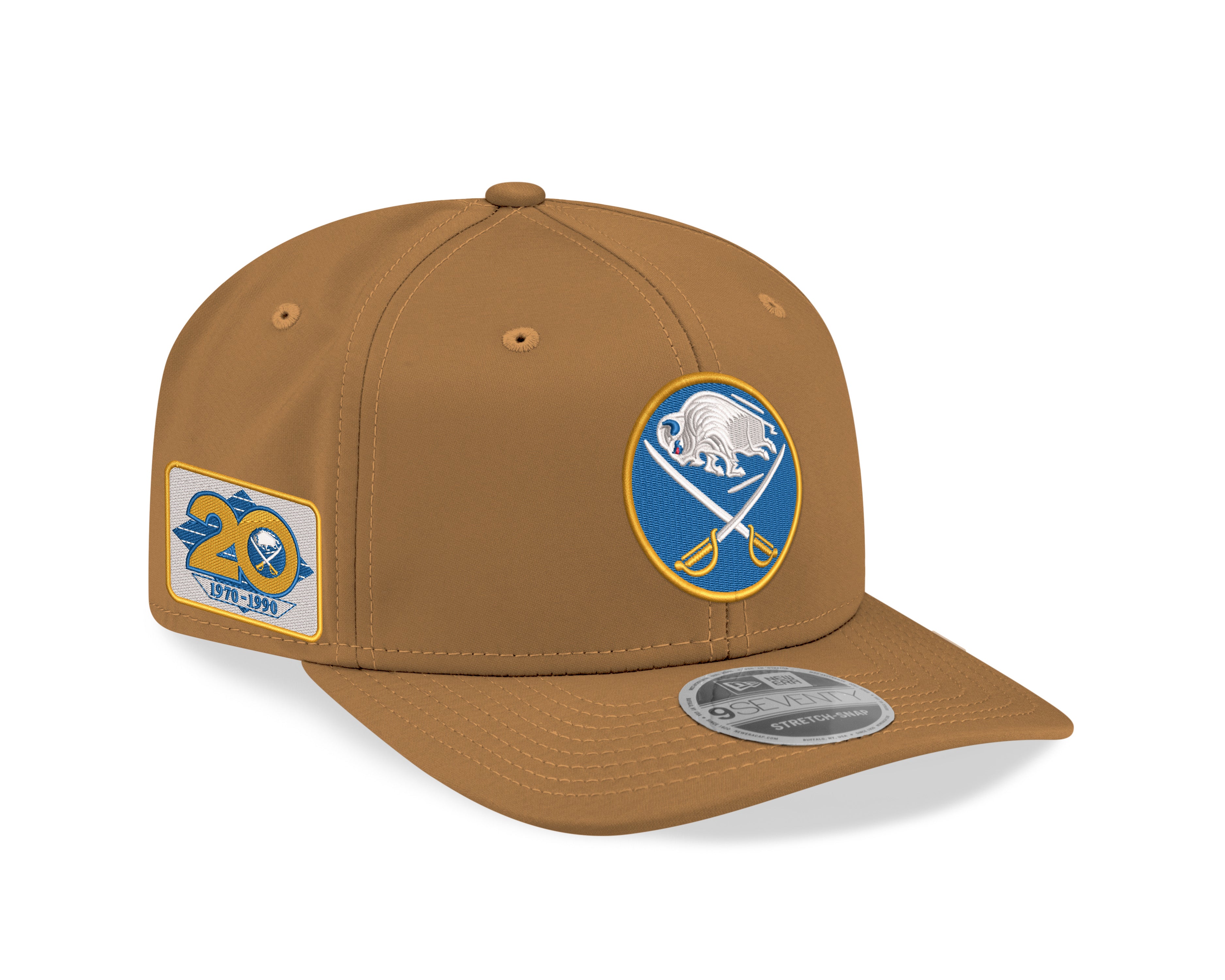 Brown baseball cap with sports team logo and patches on a white background