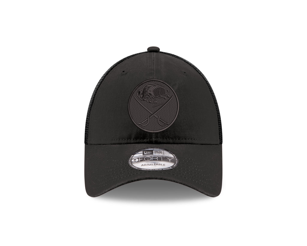Black trucker cap with a logo on a white background