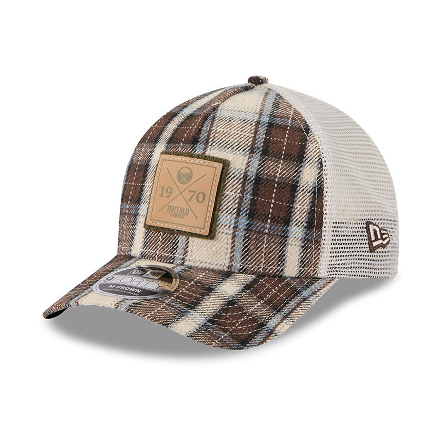 Plaid patterned cap with a brand logo on a white background