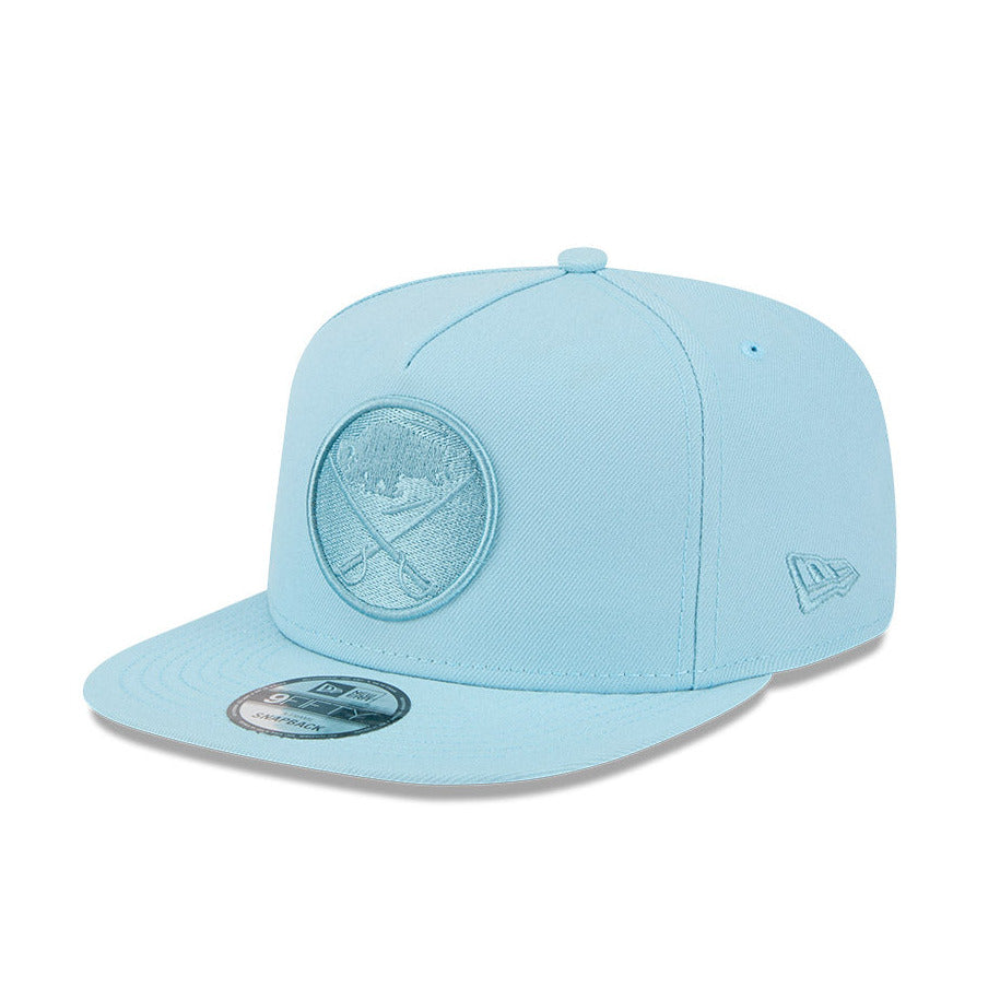 Light blue baseball cap with a Buffalo Sabres primary logo 