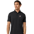 A man wearing a black short-sleeve polo shirt with a small embroidered logo on the left chest, photographed against a plain white background.