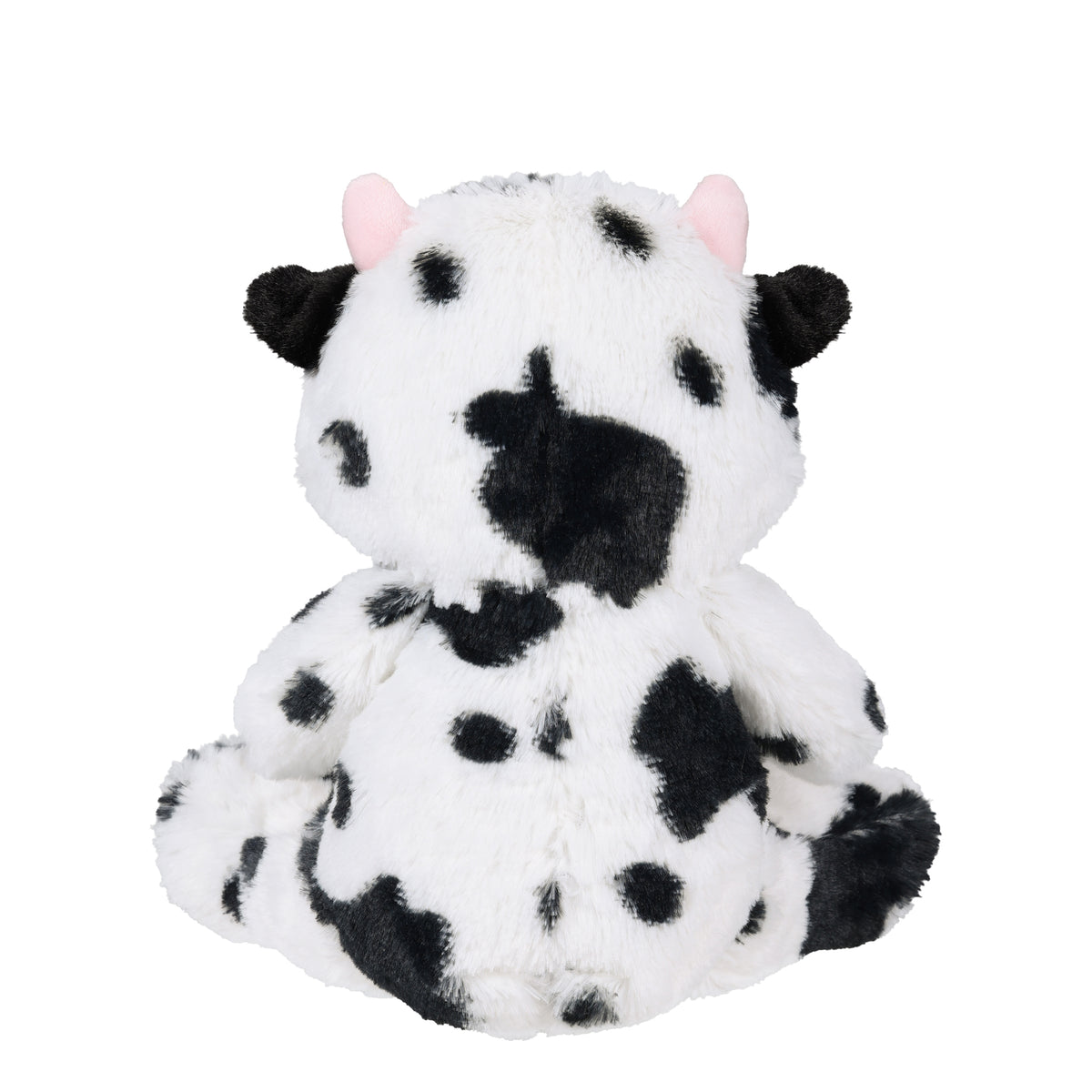 A plush cow toy shown from the back, featuring a white fuzzy body with black spots, black ears, and small pink ears, set against a plain white background.