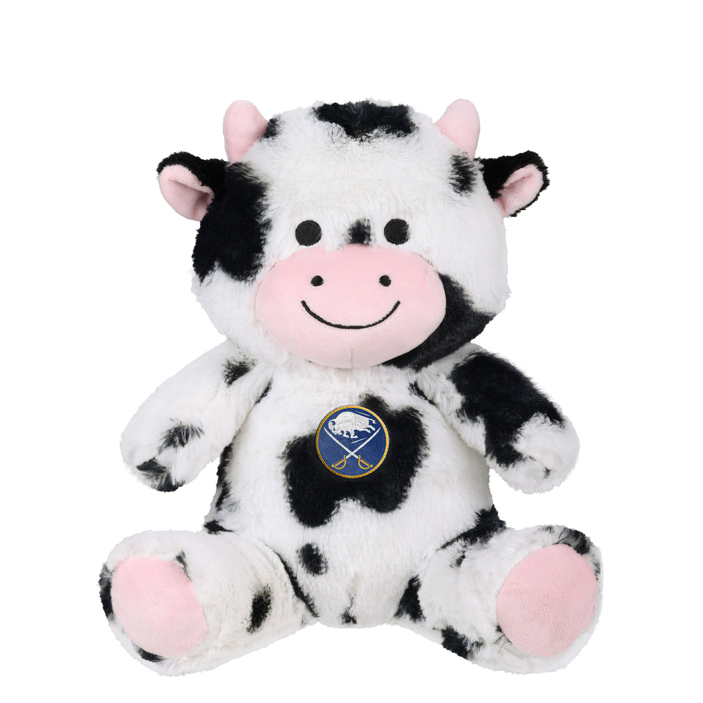 A Buffalo Sabins plush toy cow with a black and white spotted pattern, pink snout and hooves, and a circular Buffalo Sabins logo on its chest, set against a plain white background.