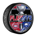 Hockey puck featuring the Stanley Cup logo and the logos for the Montreal Canadiens and the Buffalo Sabres