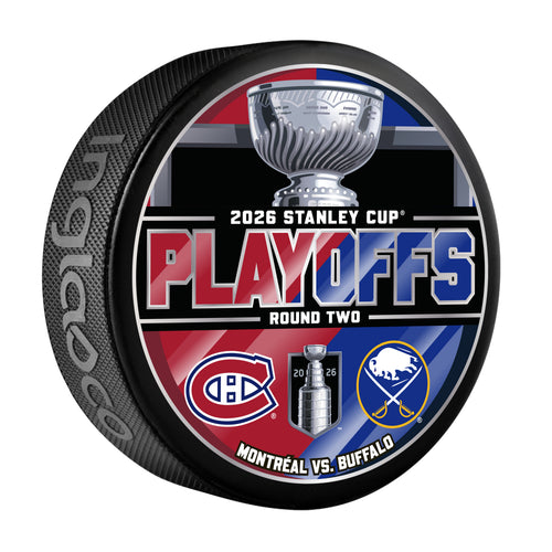 Hockey puck featuring the Stanley Cup logo and the logos for the Montreal Canadiens and the Buffalo Sabres