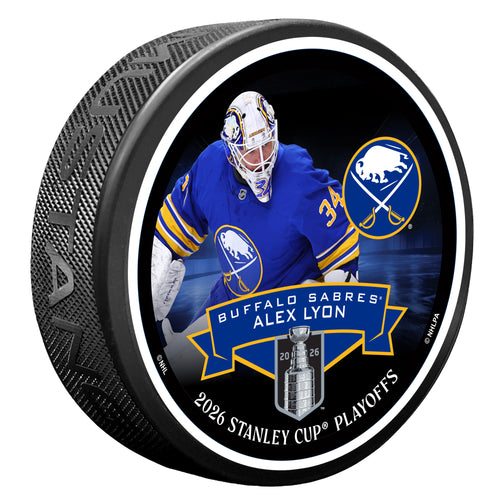 Hockey puck with a player image and text on a black background