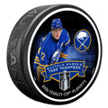 Hockey puck with Buffalo Sabres player and Stanley Cup playoffs branding