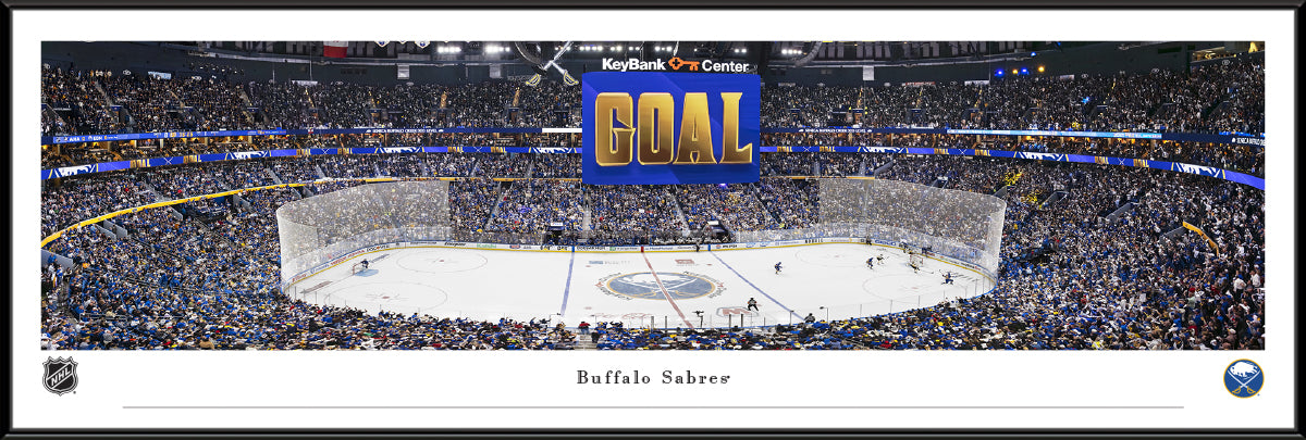 Hockey arena with 'GOAL' text and crowd in the stands