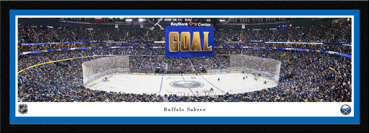 Panoramic view of a hockey arena with 'GOAL' sign and 'Buffalo Sabres' branding.