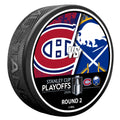 Puck with Montreal Canadiens and Buffalo Sabres logos for Stanley Cup Playoffs