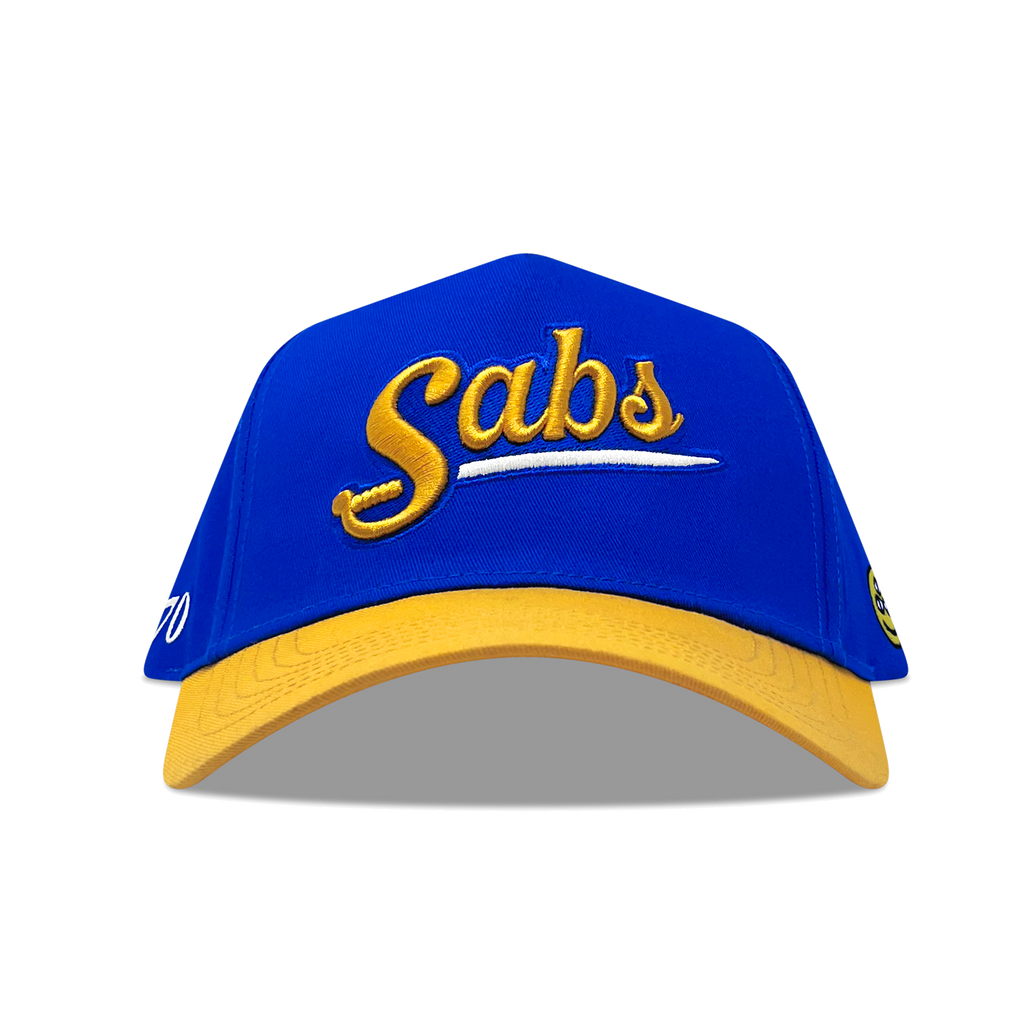 Blue and yellow cap with 'Sabs' logo on a white background