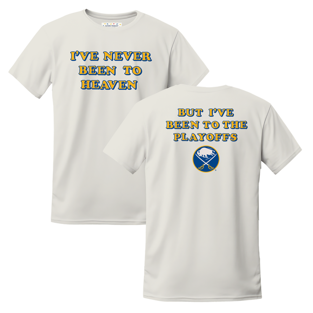 White t-shirt with humorous text and sports team logo on a white background